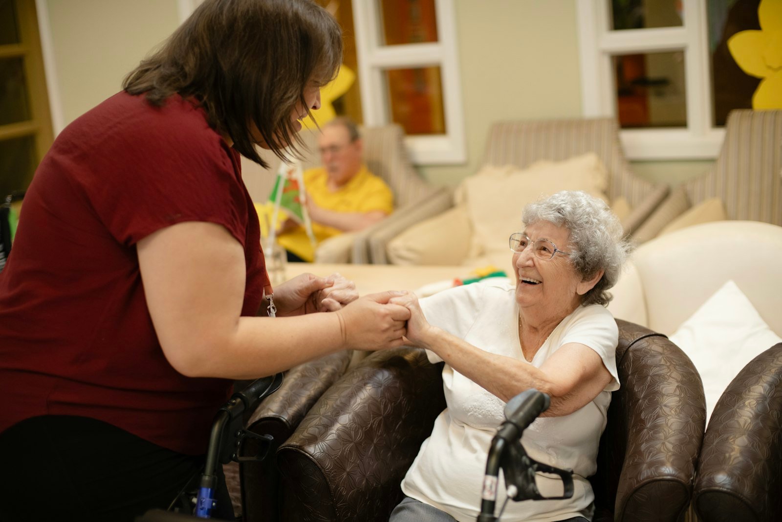 Caregiver providing personal care assistance
